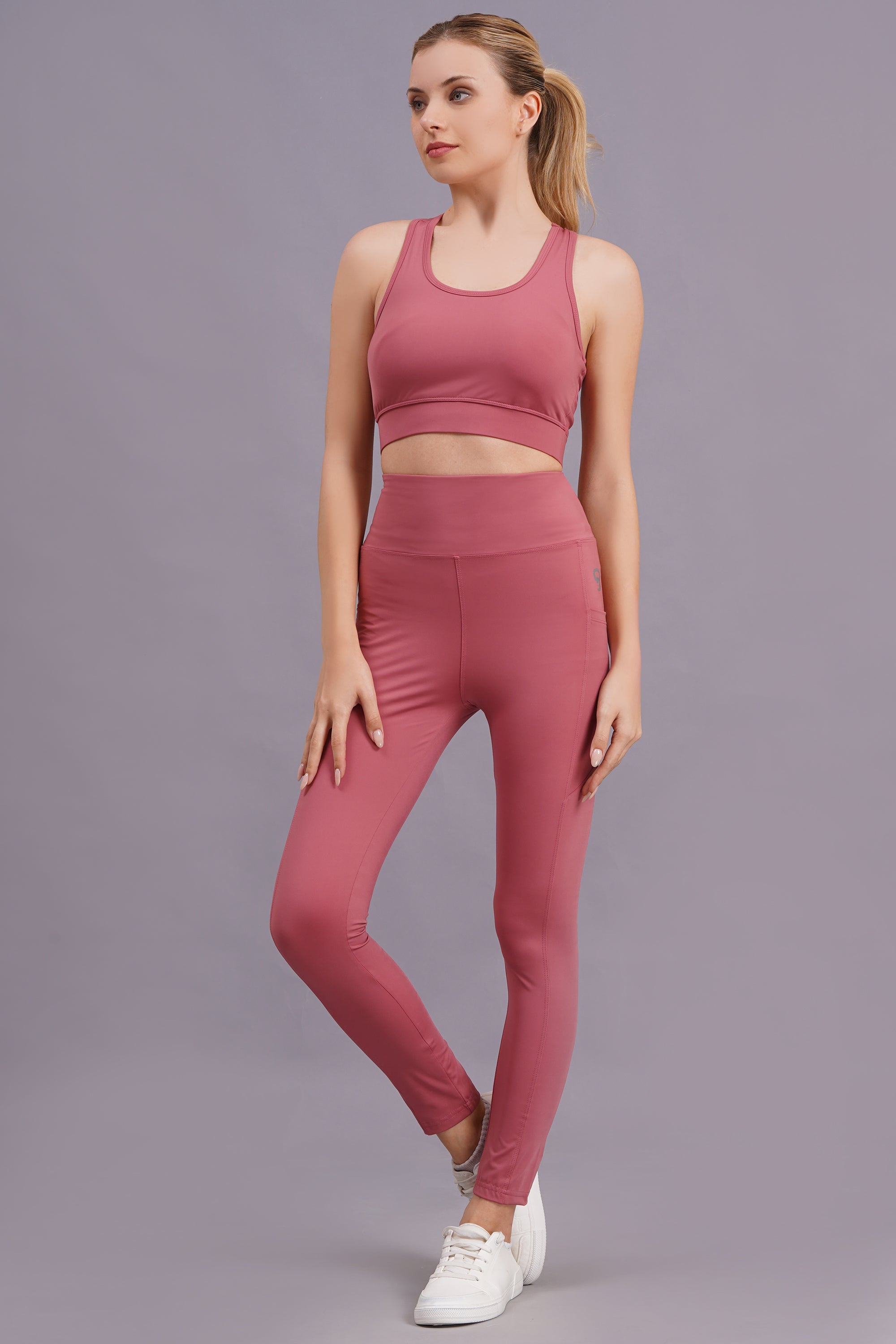 Women Peach Solid Sports Tracksuit