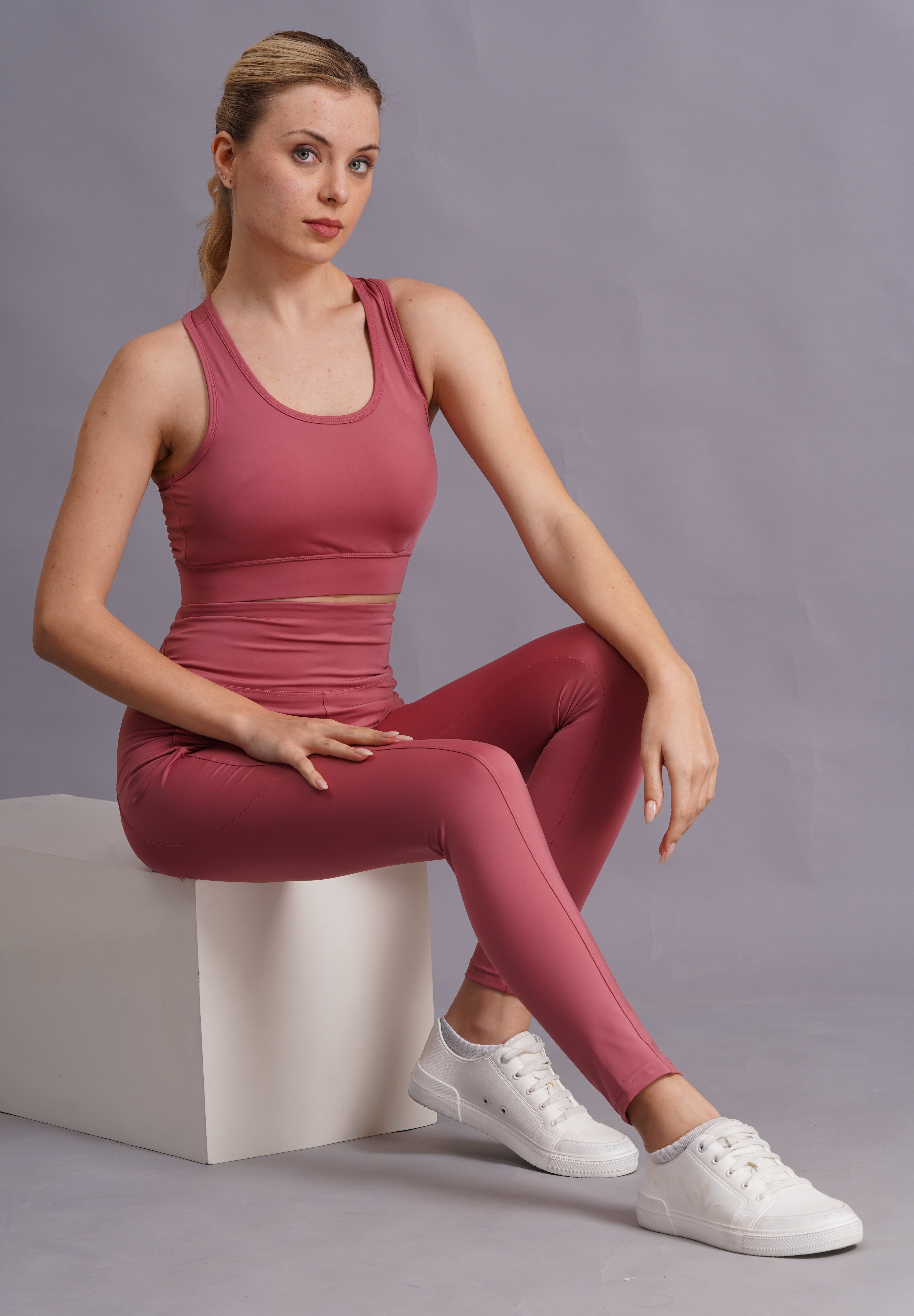 Women Peach Solid Sports Tracksuit