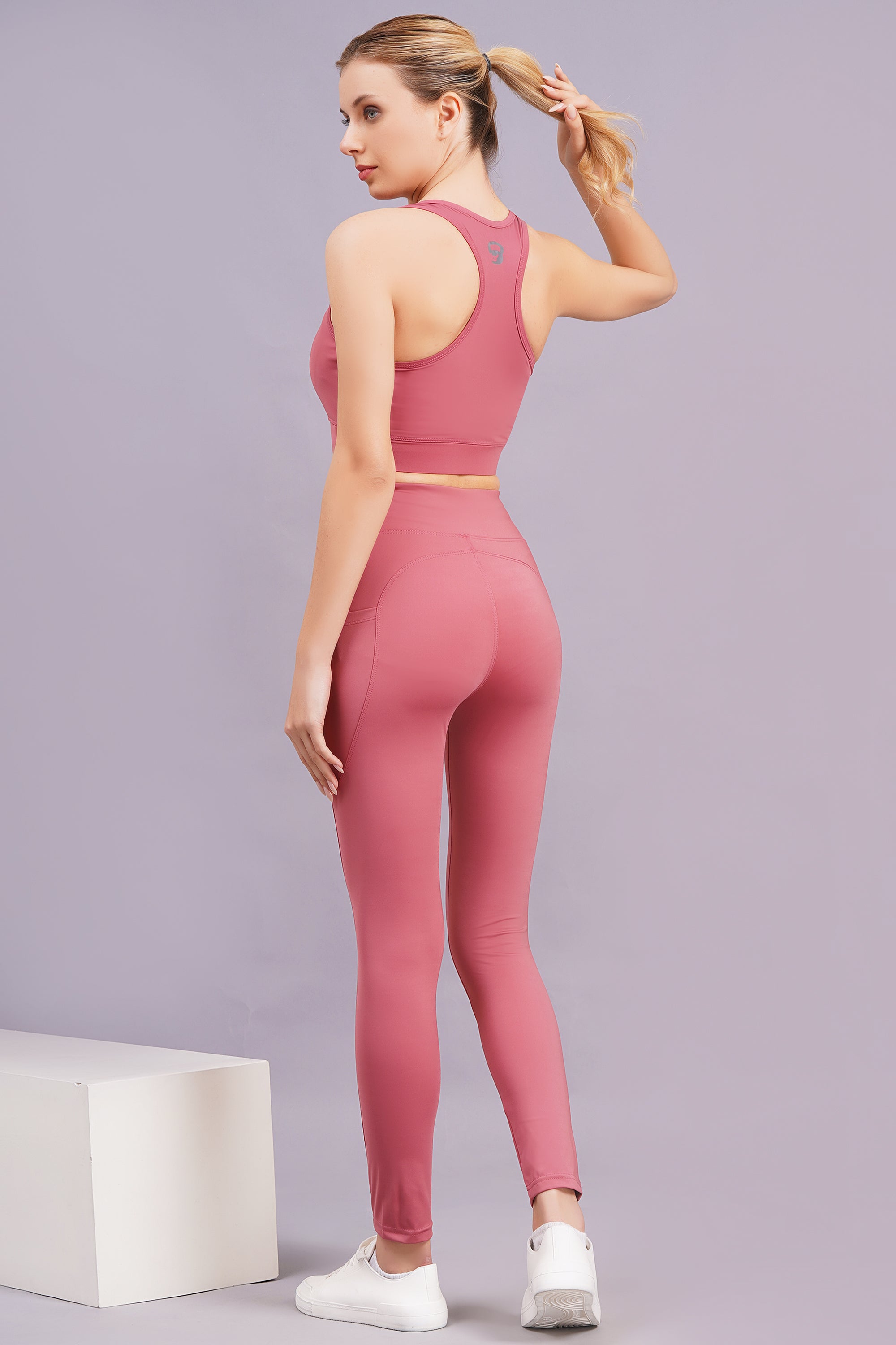 Women Peach Solid Sports Tracksuit